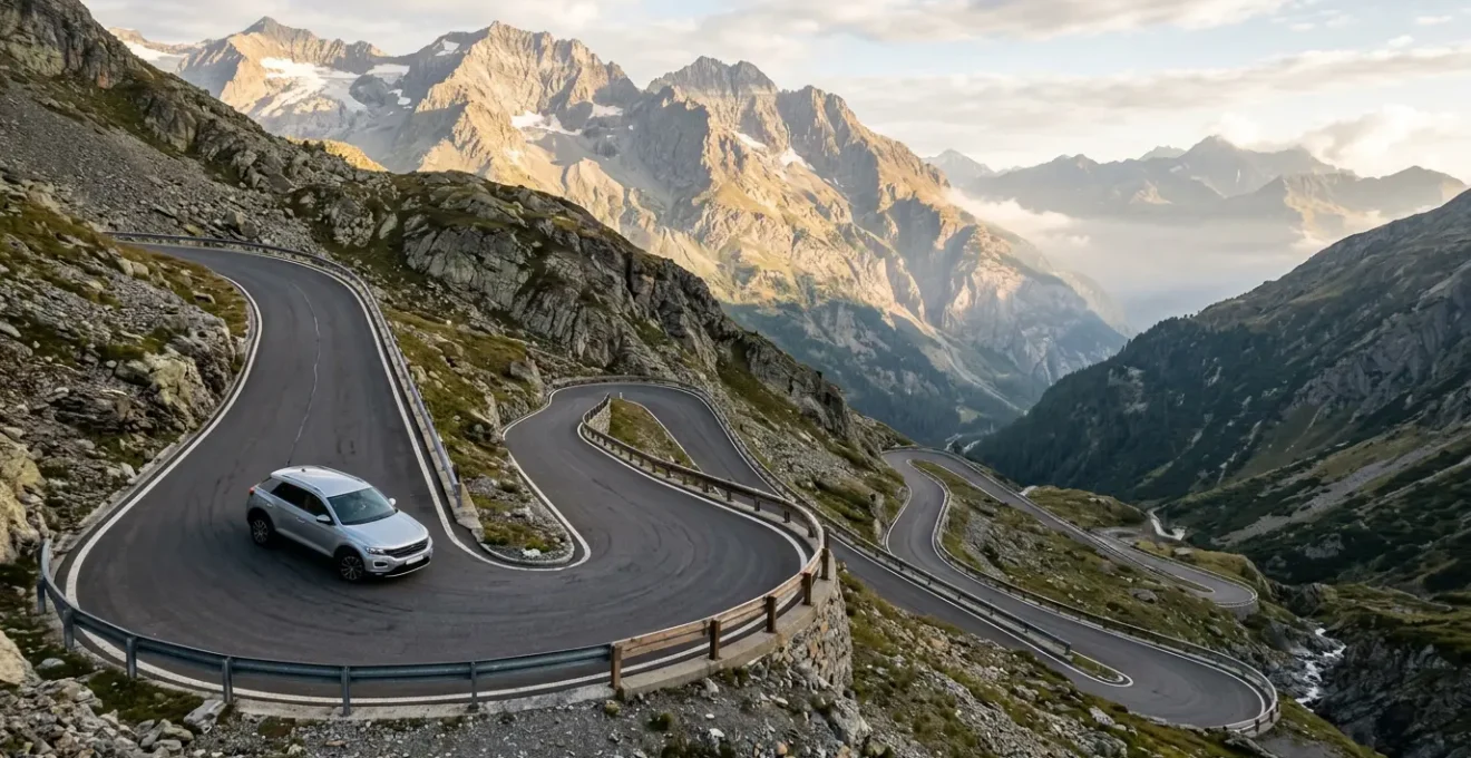 Voiture compacte moderne négociant un virage en montagne avec pente raide et paysage spectaculaire